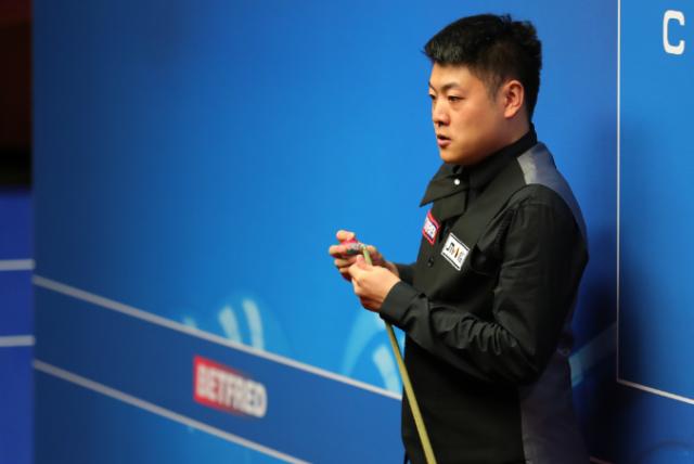 世锦赛梁文博再负罗伯逊 马奎尔成首位出局种子